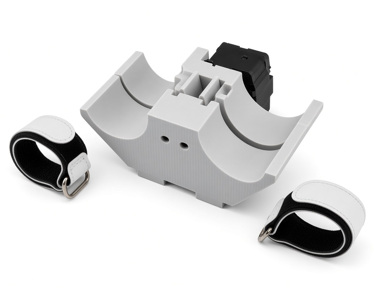 FlySpark 60ZD2 drone payload dropper empty, showing the two curved Ø60 mm-class cradles, central latch tower, servo housing and removable retention straps
