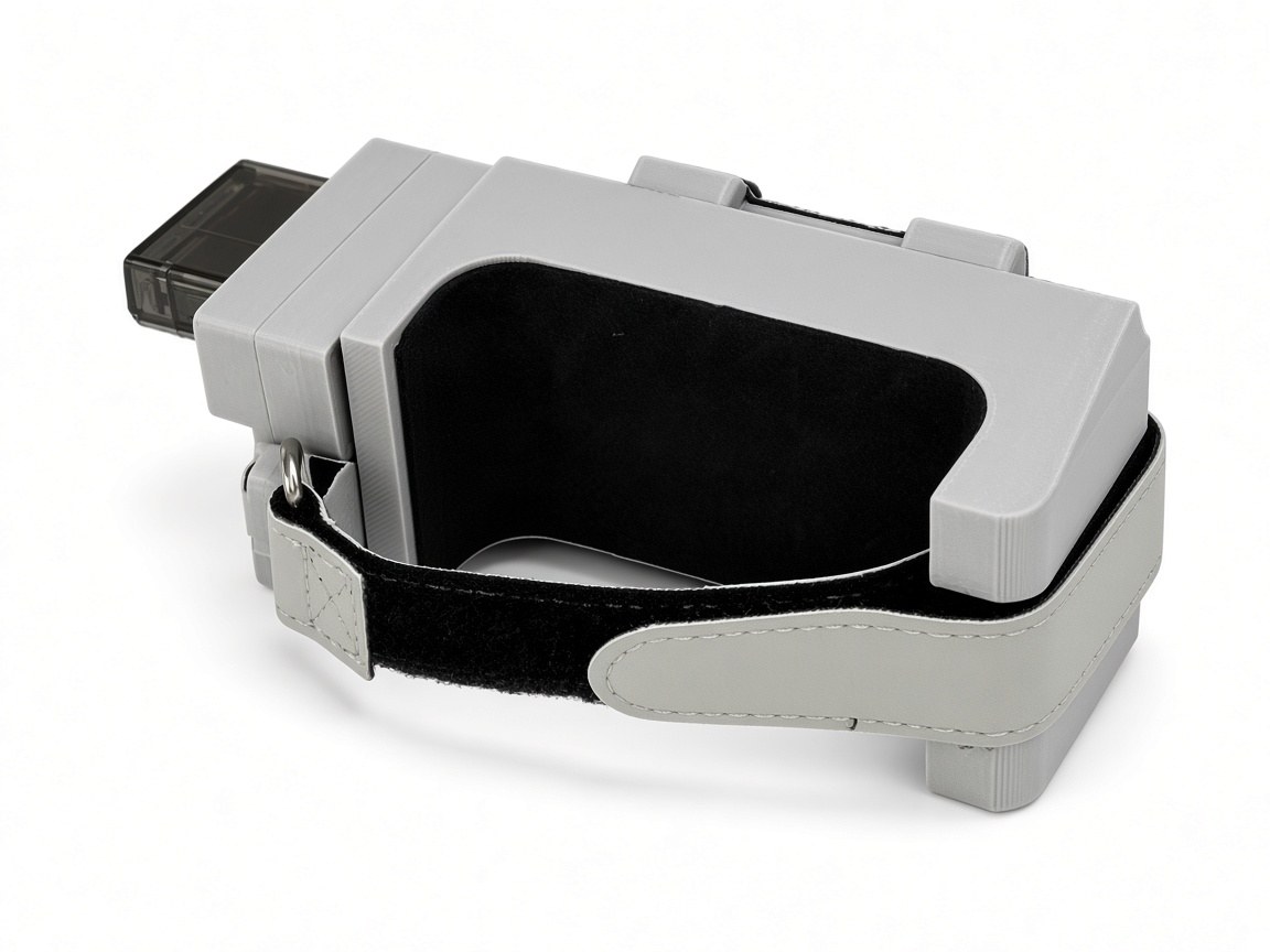 FlySpark Mothership drone release mount rear three-quarter view showing the strap, cradle and latch lugs
